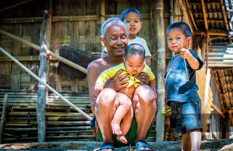 Indigenous Grandpapa with his grandsons